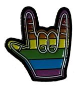 pin of a rainbow hand giving devil horns
